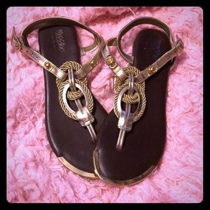 Really cute gold strappy flat sandal